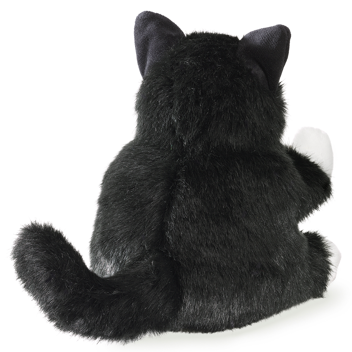 Folkmanis tuxedo kitten hand puppet in black and white, seen from behind in a sitting position, with a bushy tail and white paws
