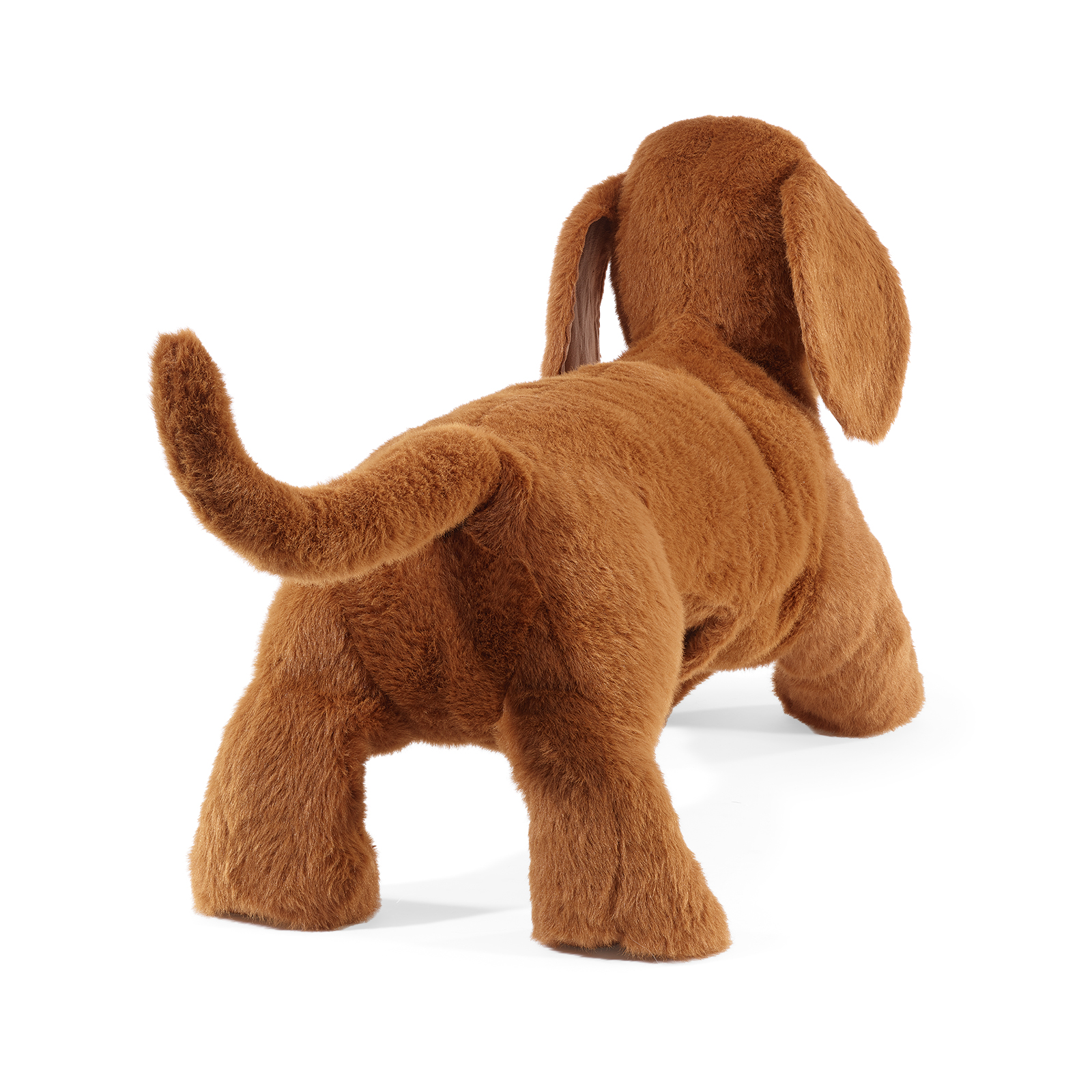 Folkmanis Handpuppe Dackel von hinten, der Schwanz aufgestellt und ein Schlappohr seitlich sichtbar.