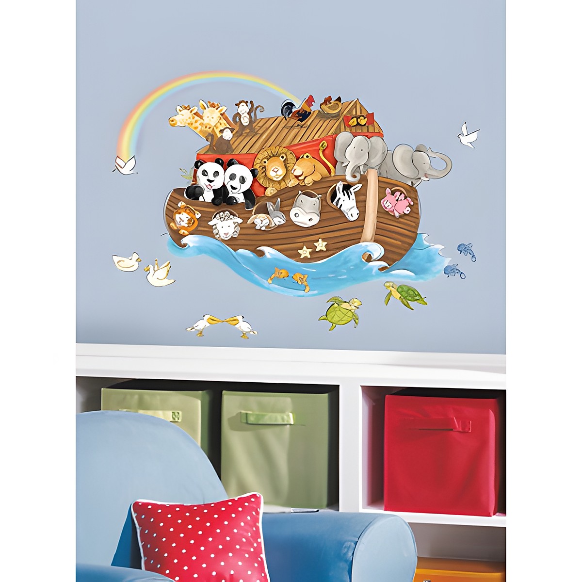RoomMates wall decal Noah's Ark, ark with animal pairs such as lion, elephant, panda and zebra under a rainbow on a blue children's room wall above storage boxes