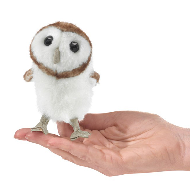 Folkmanis mini barn owl finger puppet with white belly and brown back, balancing on a flat hand