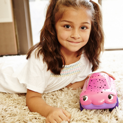Cloud b Twilight Carz Pink Hearts, lifestyle photo with smiling girl and pink car night light