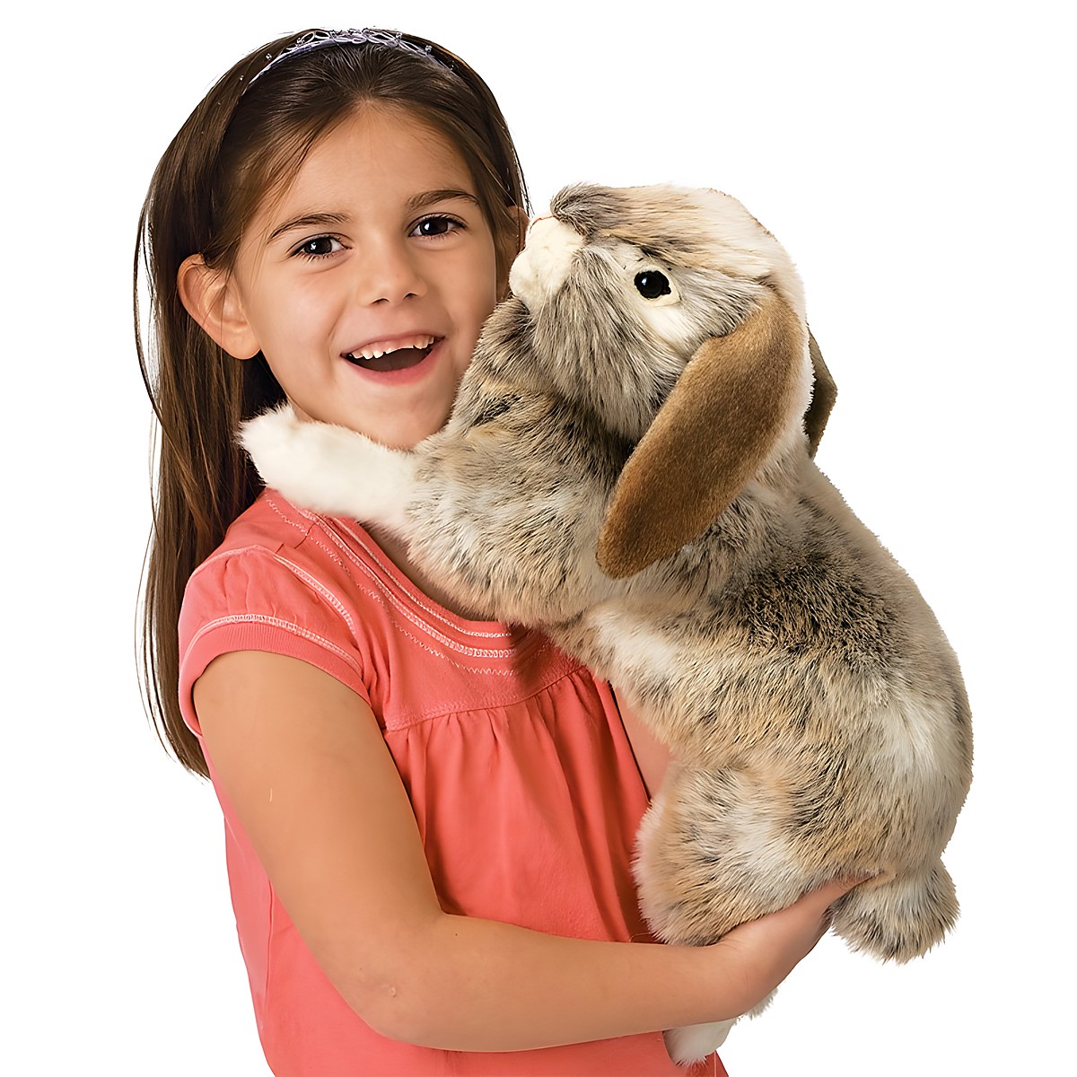 Girl holding the Folkmanis Holland Lop rabbit hand puppet with grey-brown mottled fur and drooping ears in her arms