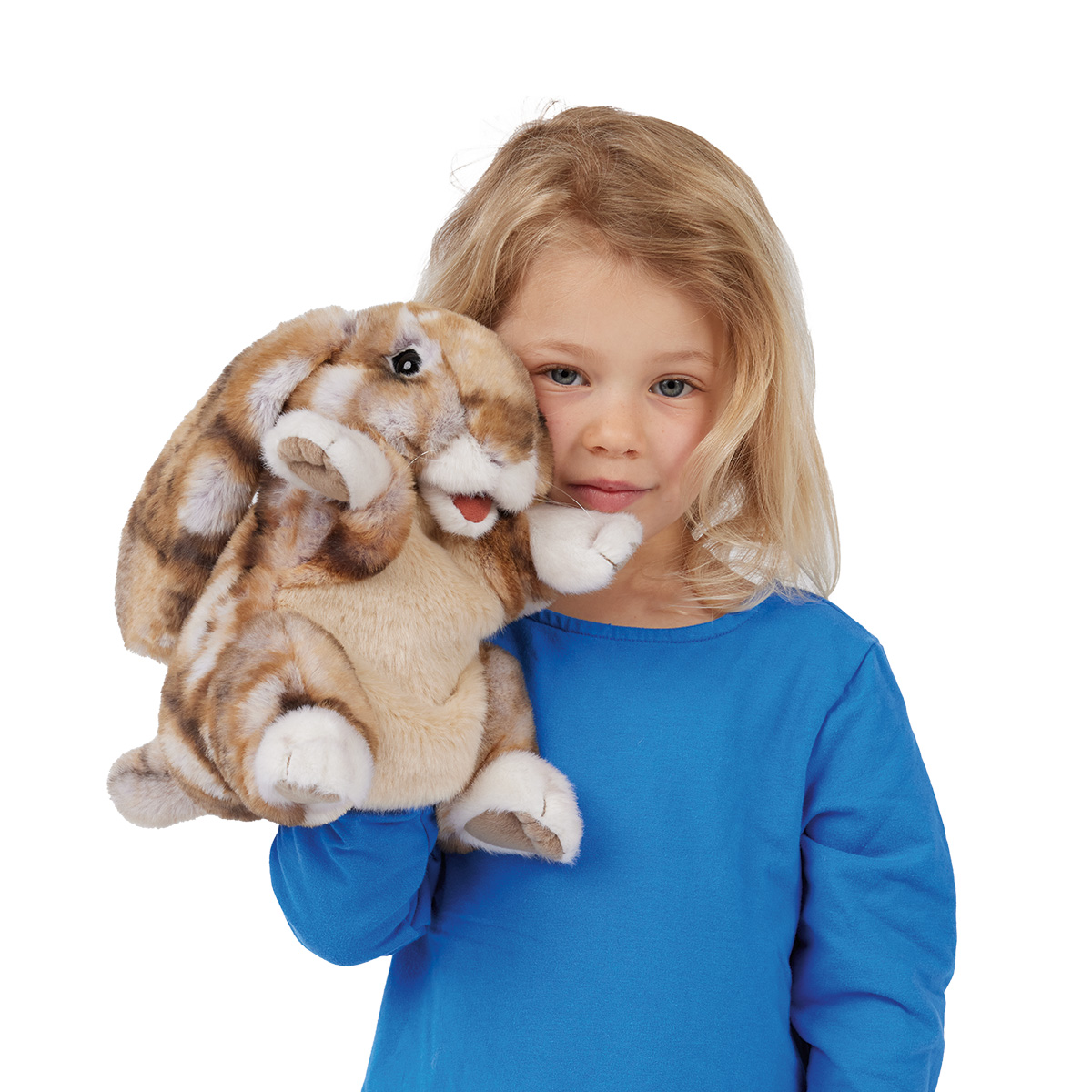 Girl operating a Folkmanis lop-eared rabbit hand puppet with brown-spotted fur, white paws and a movable open mouth