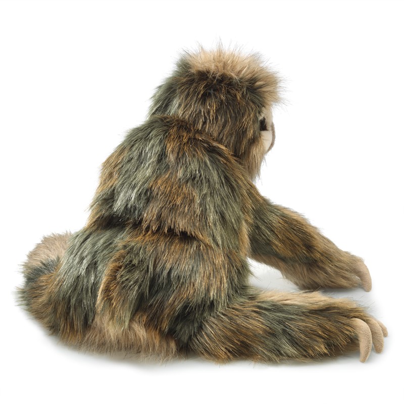 Folkmanis three-toed sloth hand puppet with grey-brown melange long fur, photographed from a rear three-quarter angle
