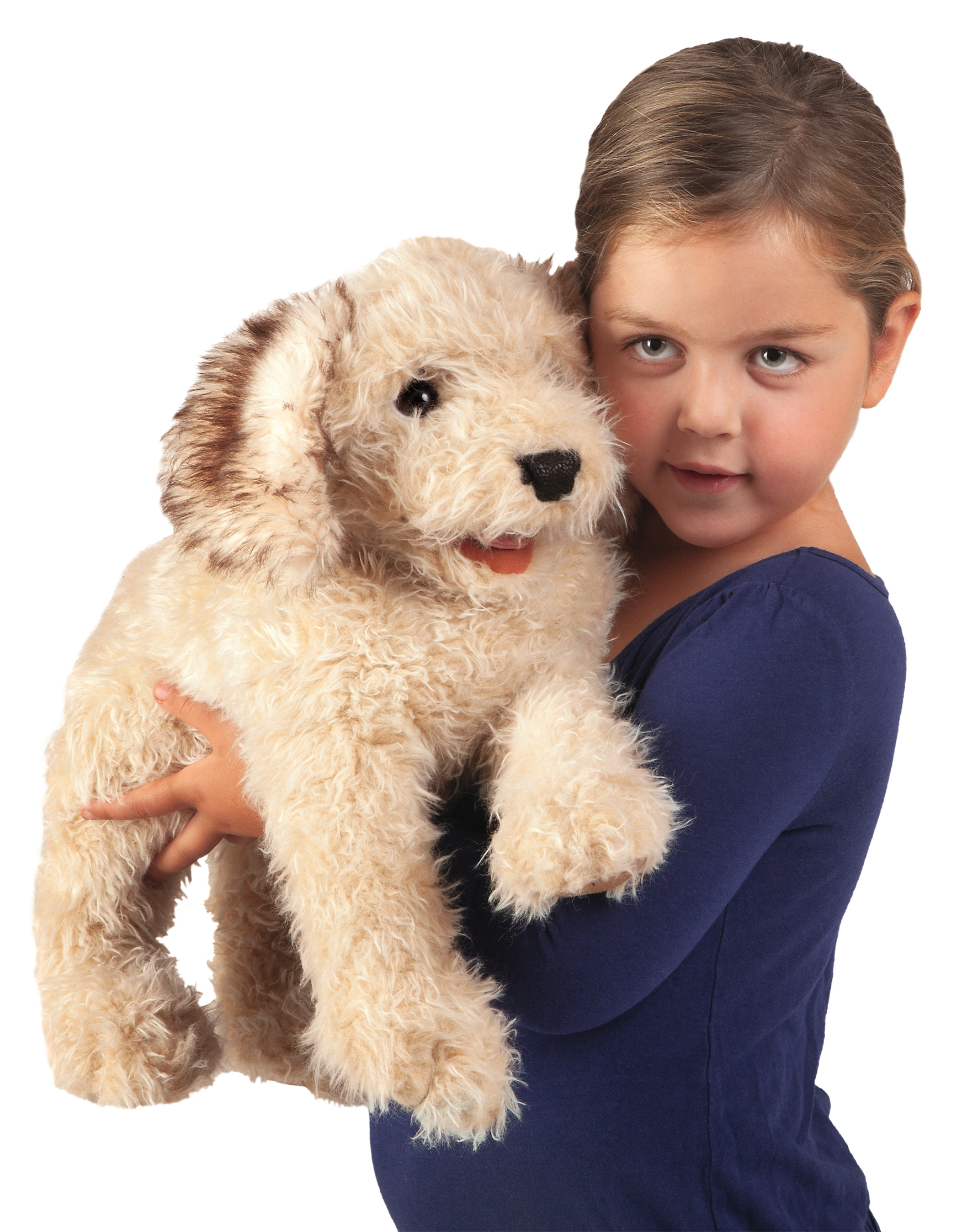 Girl holding the Folkmanis Labradoodle hand puppet with cream curly fur and brown ears in her arms
