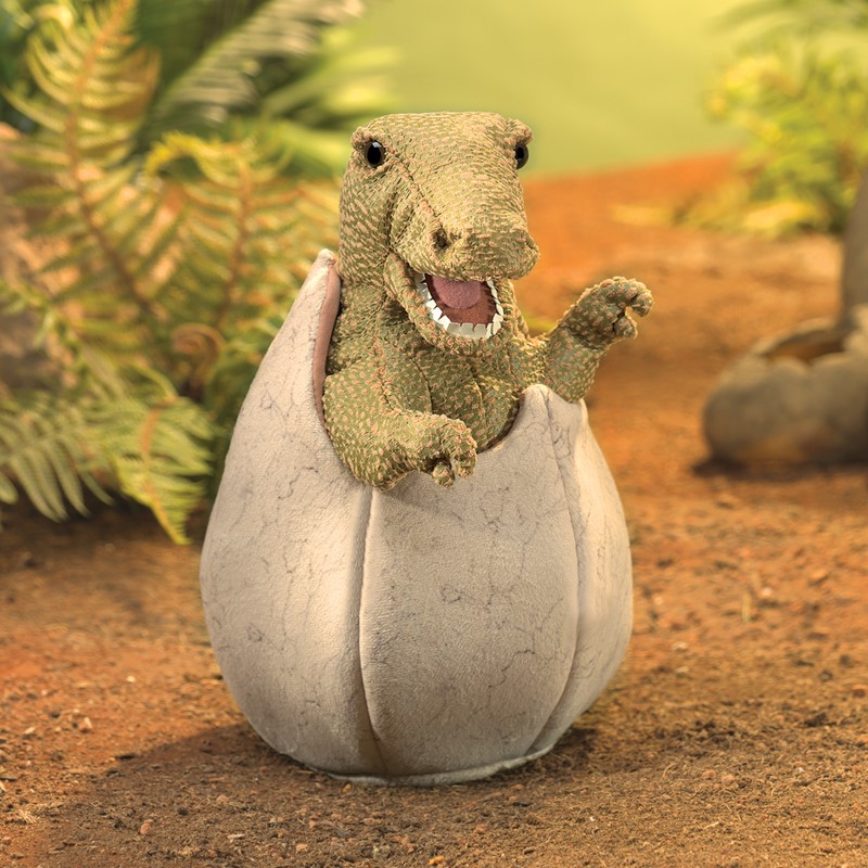 Folkmanis Handpuppe Saurierbaby im Ei: grüner Dinosaurier schlüpft aus grau-weißem Plüsch-Ei, geöffnetes Maul mit Zähnen, Frontalansicht
