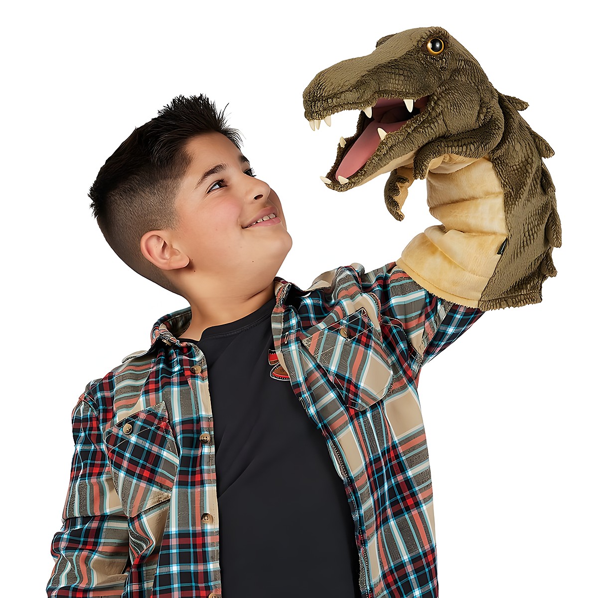 Boy holding a Folkmanis crocodile hand puppet with open mouth and visible teeth up in the air