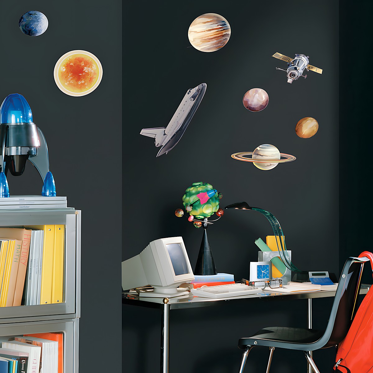 RoomMates wall decal Space Travel, photorealistic planets, space shuttle and space station on a dark wall above a desk