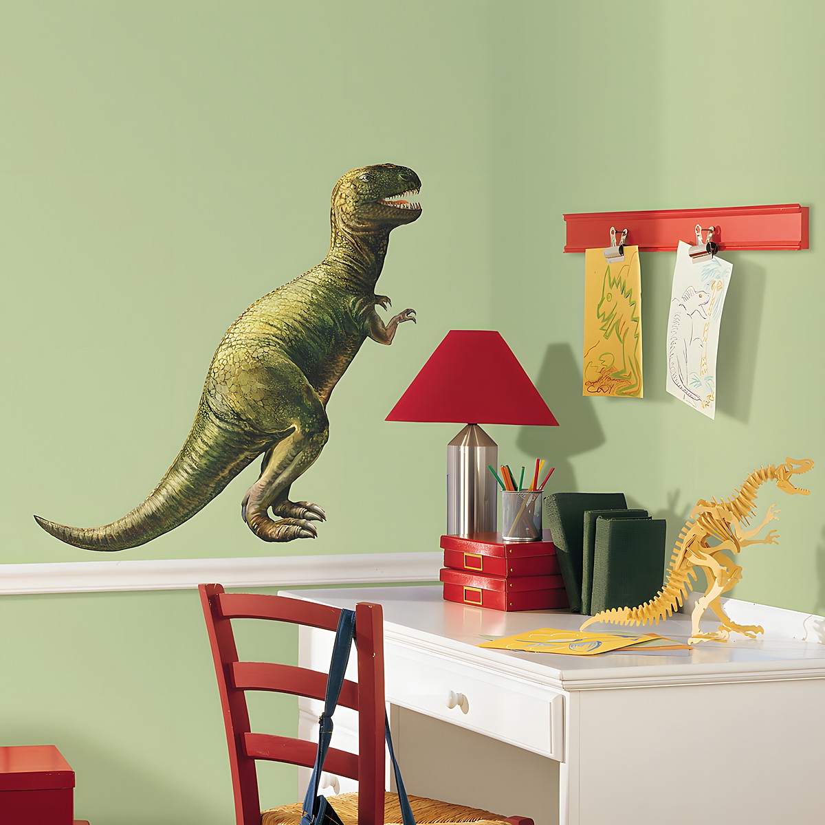 RoomMates wall decal Dinosaur, large green T-Rex on a green children's room wall next to a desk