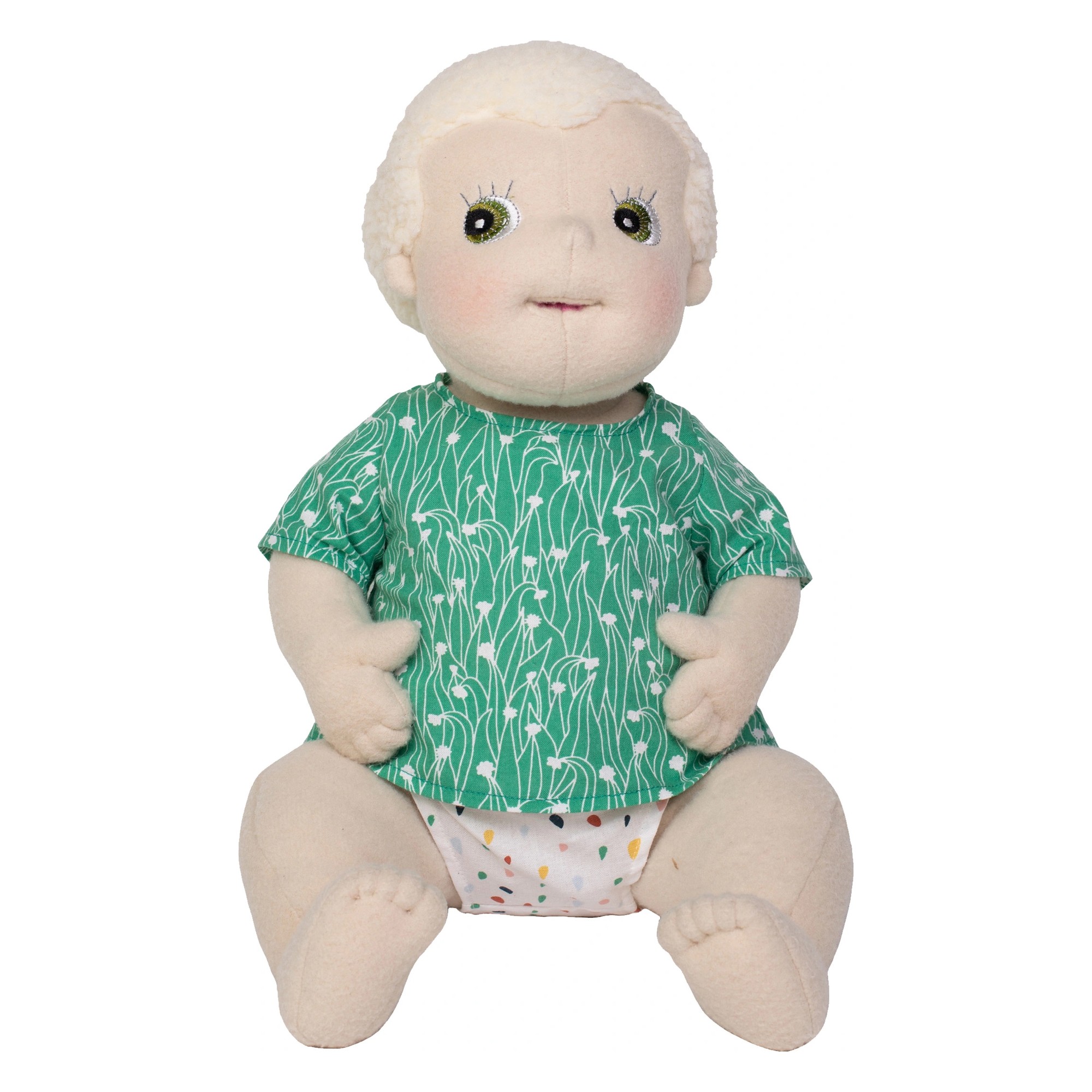 Rubens Barn baby doll Carl with light hair, green patterned shirt and colourful nappy pants, sitting
