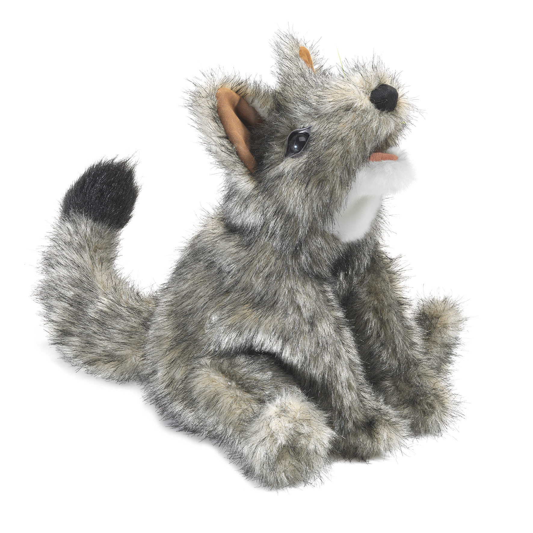 Folkmanis small coyote hand puppet sitting, grey-flecked plush fur, brown ears, black tail tip, open mouth with red tongue