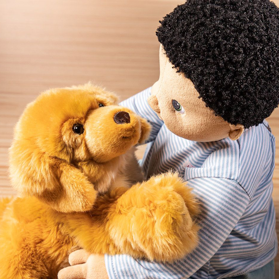 Joyk empathy doll Antonio hugging the dog empathy doll Brando