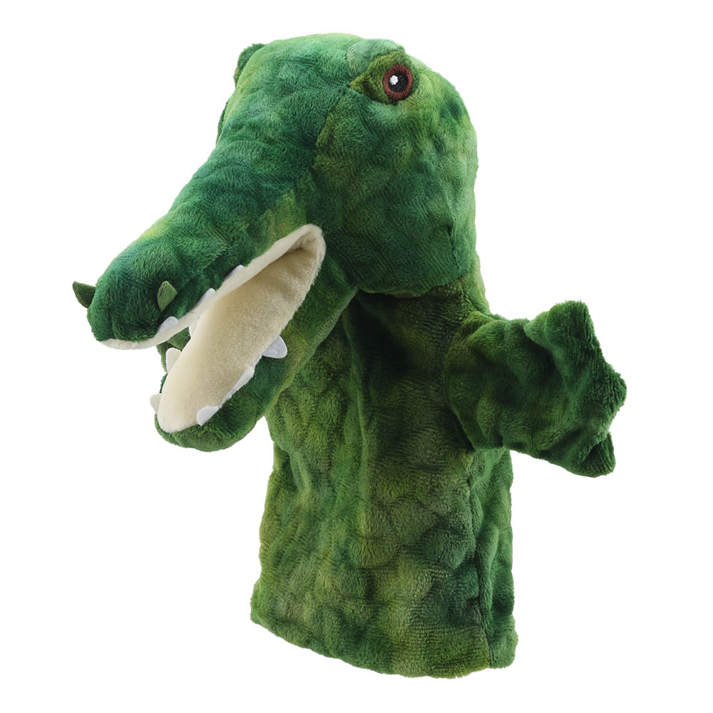 The Puppet Company crocodile hand puppet, green puppet with an open mouth and pointed teeth, close-up
