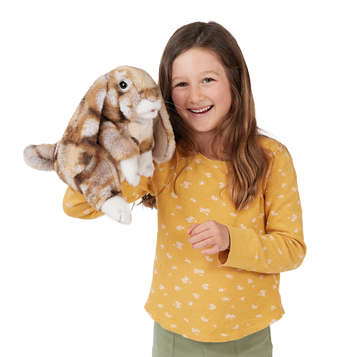 Girl holding a Folkmanis lop-eared rabbit hand puppet with brown-spotted fur and drooping ears on her hand