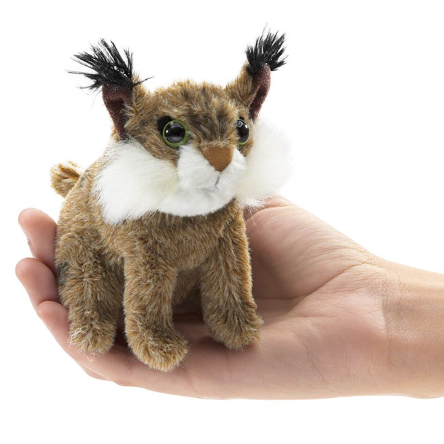 Folkmanis Mini-Fingerpuppe Luchs mit geflecktem Fell, schwarzen Pinselohren und weißem Backenbart, auf einer Handfläche
