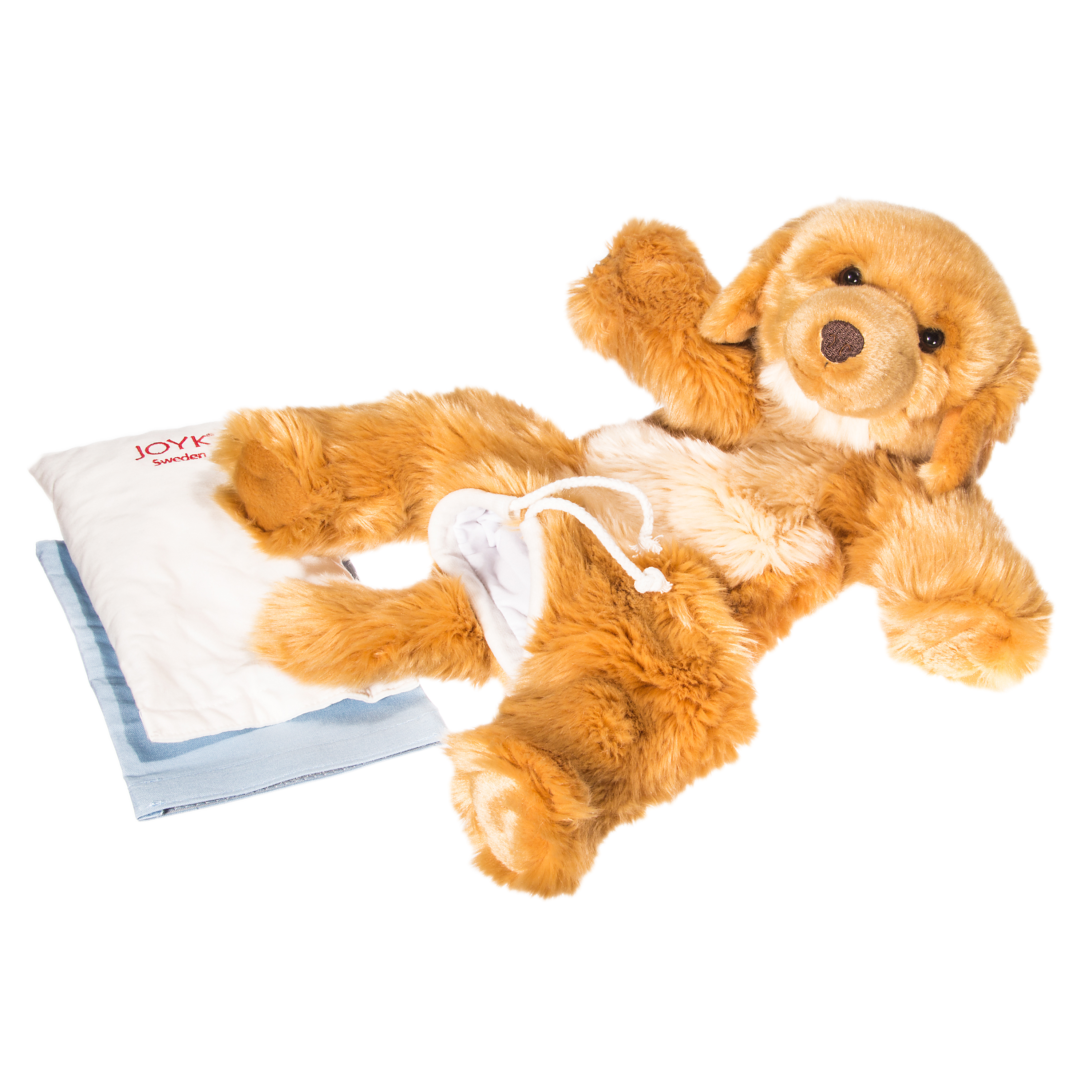 Joyk empathy doll Brando on its back with weighted pouch and positioning cushion
