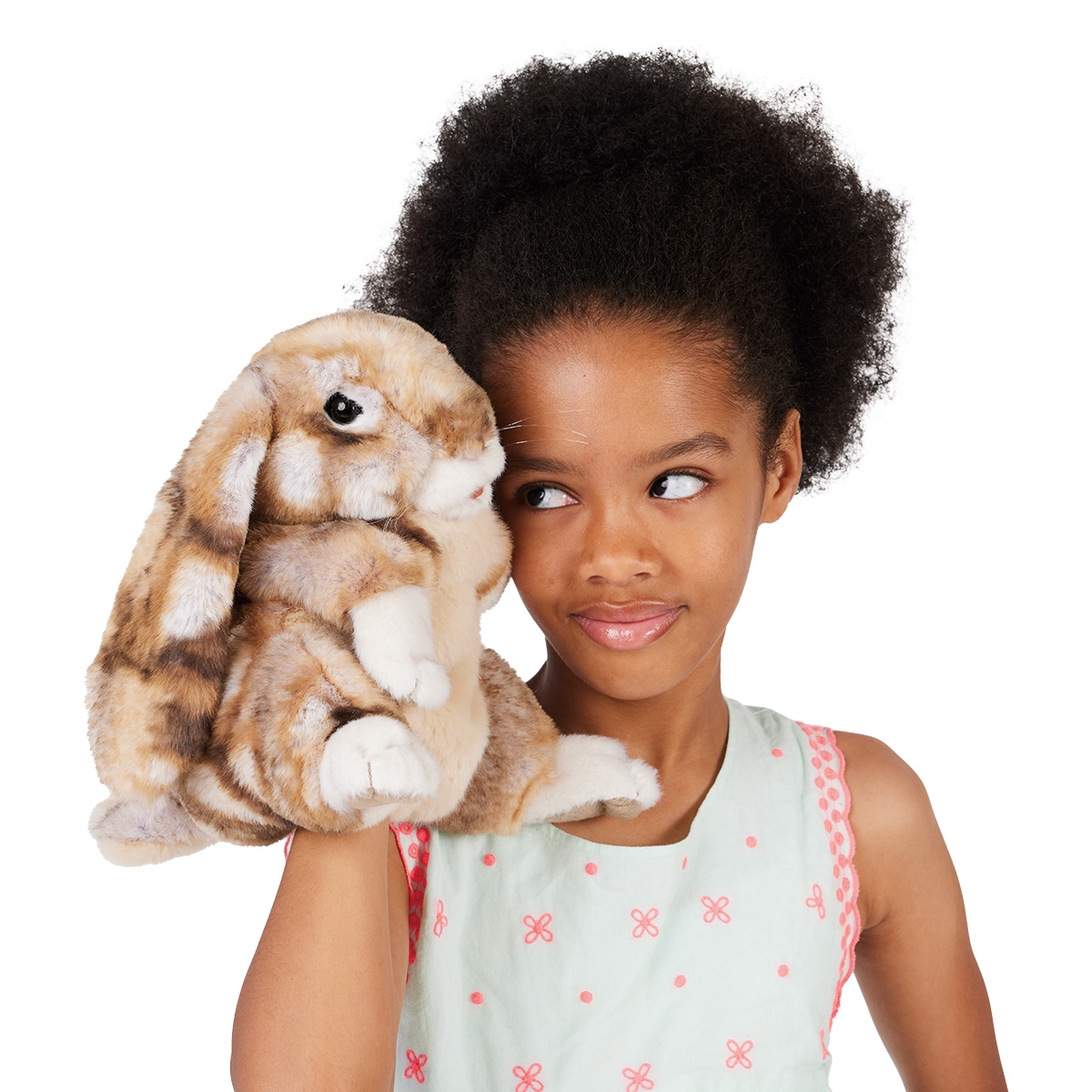 Girl wearing the Folkmanis lop-eared rabbit hand puppet with beige-brown fur and long floppy ears on her hand
