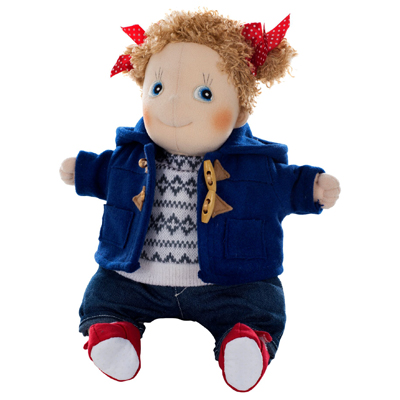 Rubens doll in the open blue duffle coat over a Nordic jumper, with red booties
