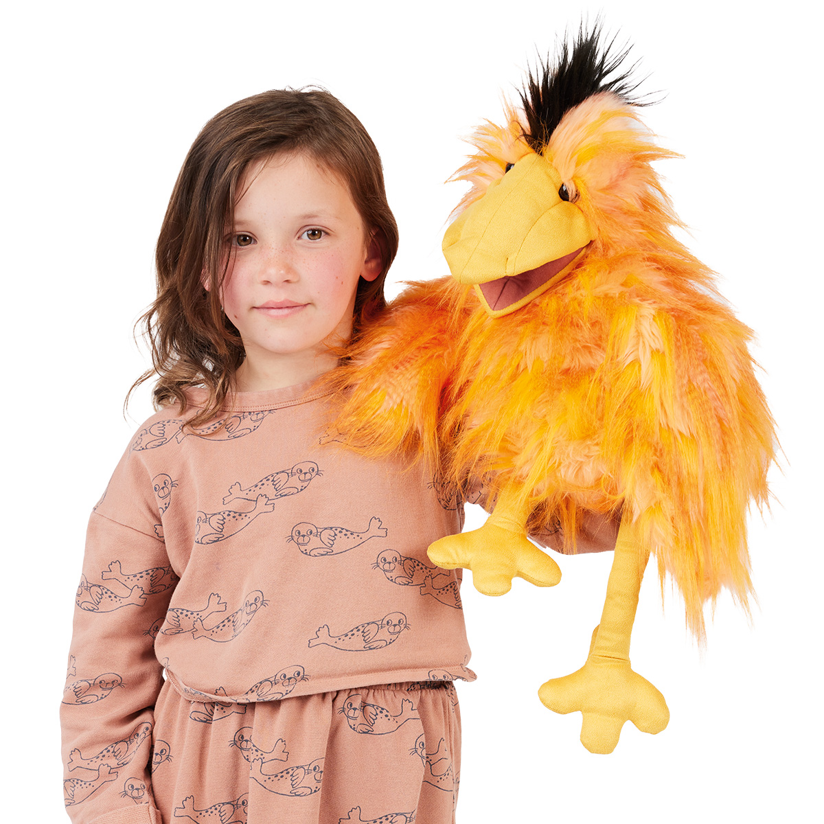 Folkmanis hand puppet silly bird in orange with black tuft of hair, yellow beak and long legs, held by a child
