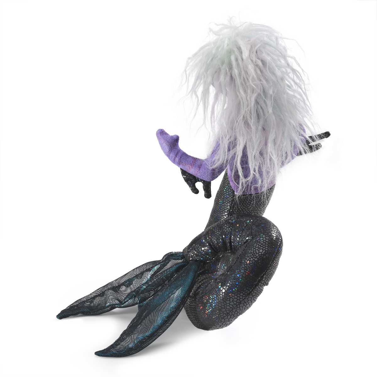 Folkmanis mini sea nymph finger puppet with a black scaly body, purple arms and a white faux-hair mane, shown from a diagonal side angle