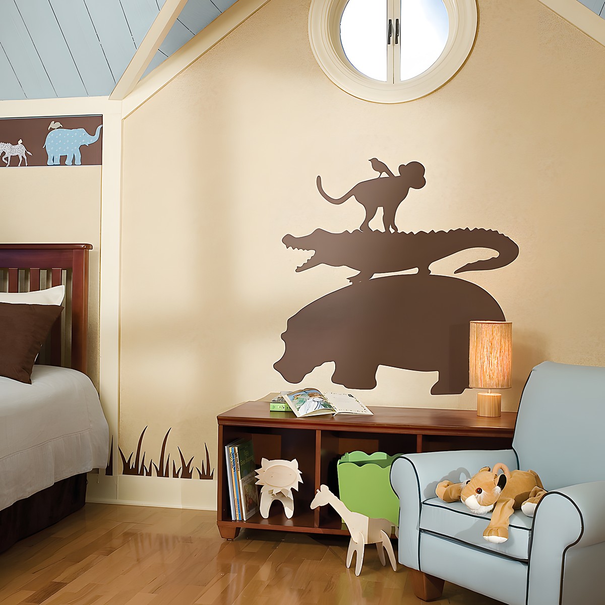 RoomMates wall decal Animal Silhouettes Brown, brown animal silhouettes of a monkey, crocodile and hippo stacked on a beige sloped-ceiling wall in a children's room