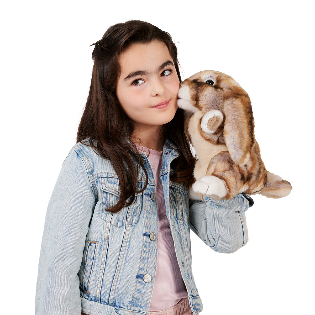 Girl holding a Folkmanis lop-eared rabbit hand puppet in brown and beige, with the puppet touching her cheek