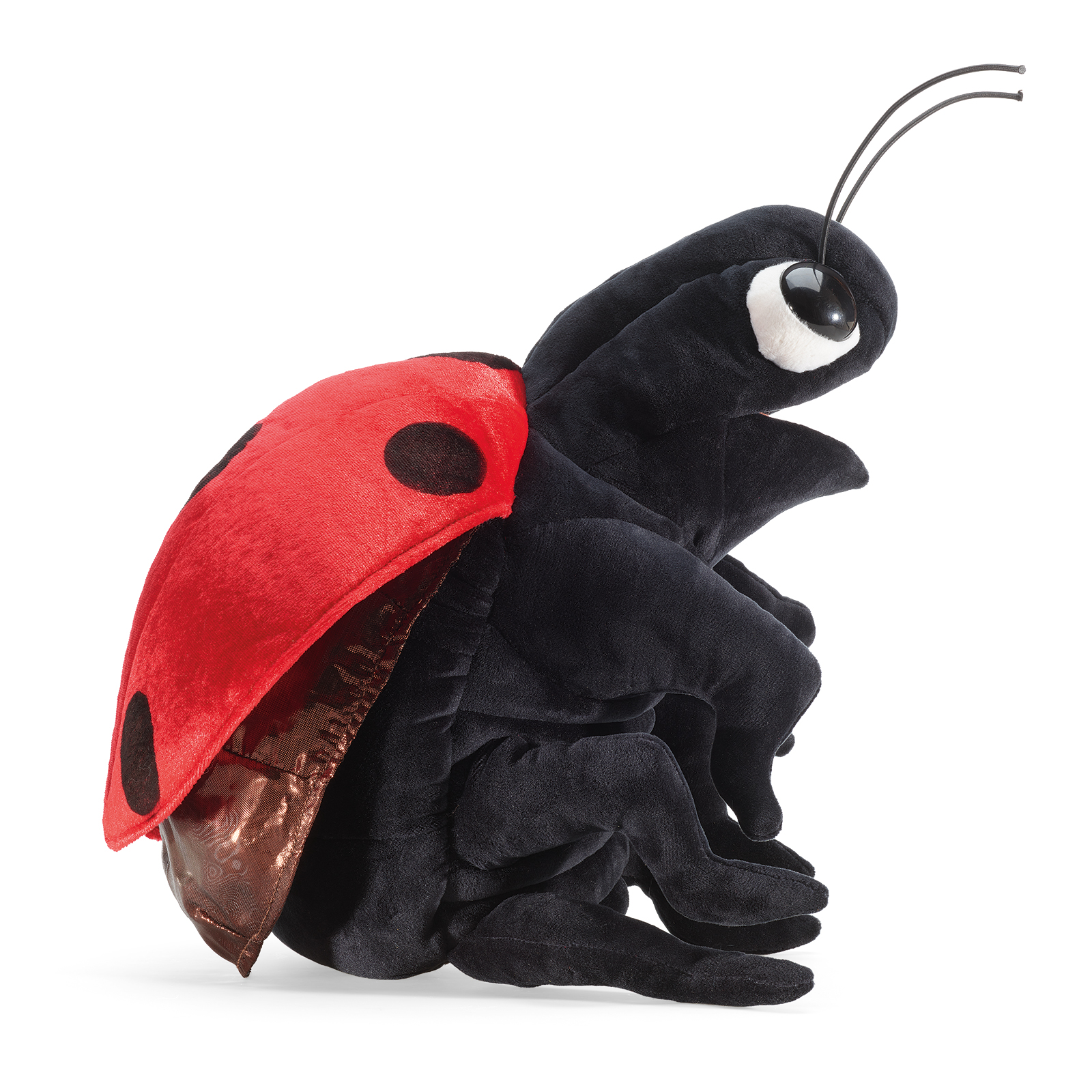 Folkmanis Handpuppe Marienkäfer in Seitenansicht, der Flügeldeckel zur Seite geklappt, die Fühler aufgerichtet.