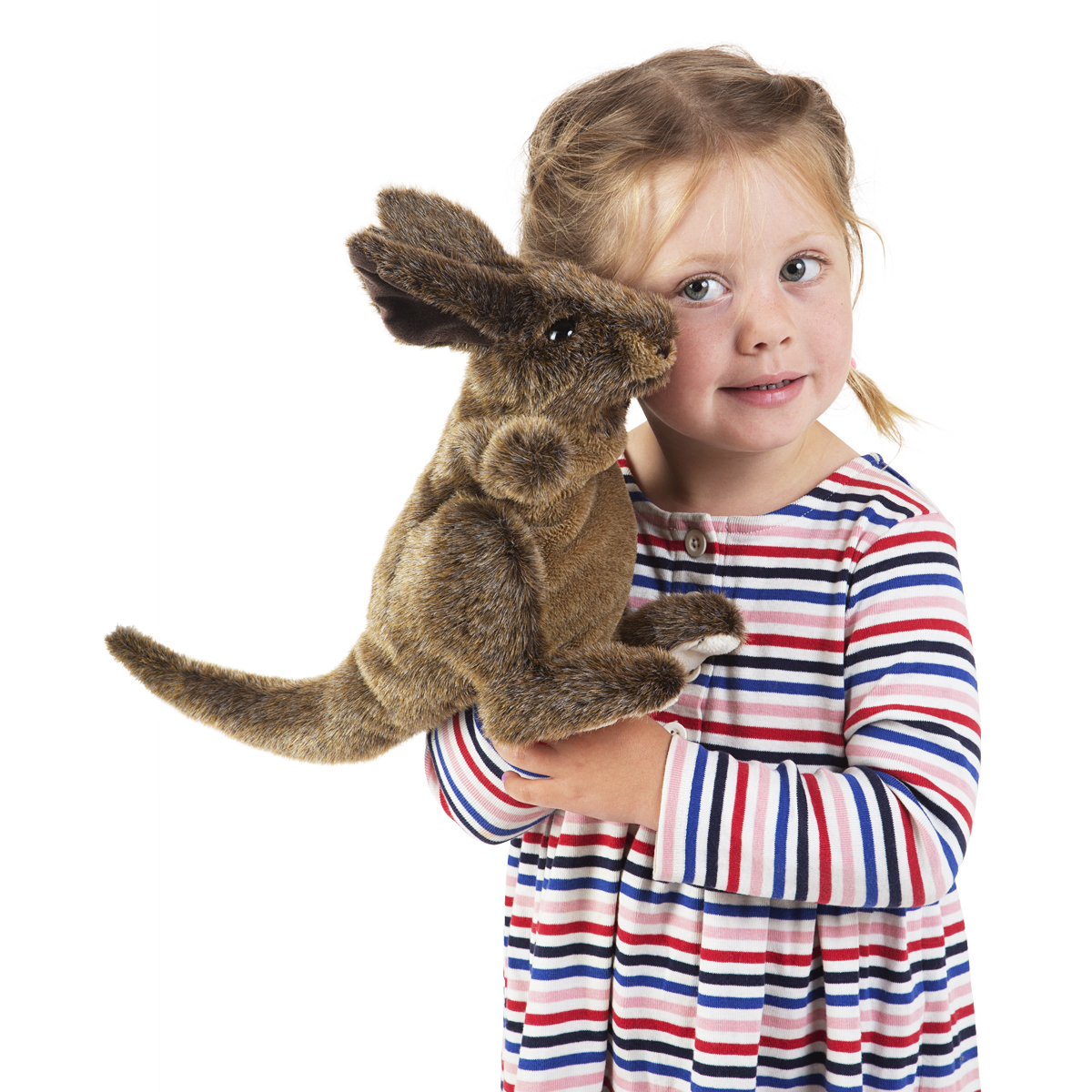 Girl holding the Folkmanis small kangaroo hand puppet with brown fur and upright ears in her arms