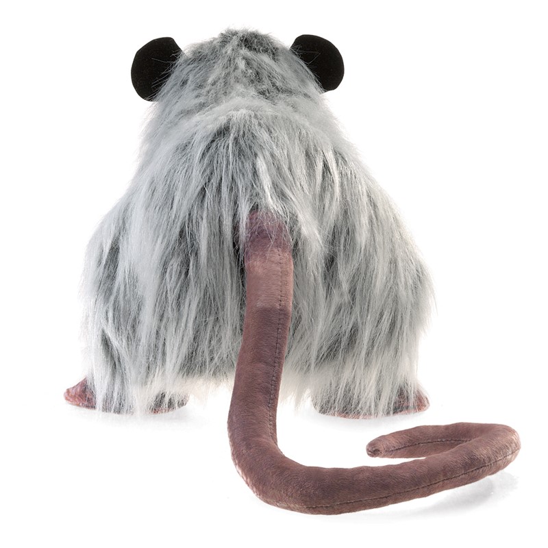 Folkmanis opossum hand puppet seen from behind with grey-white long fur, black round ears and a long brown curling tail