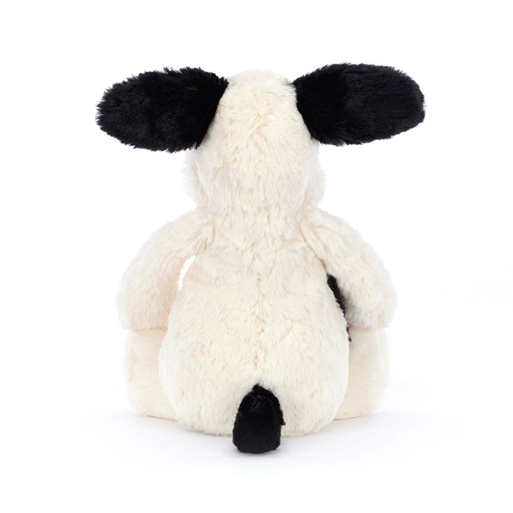 Jellycat Kuscheltier Bashful Puppy Black Cream, Rückansicht mit schwarzen Ohren und schwarzem Schwanz