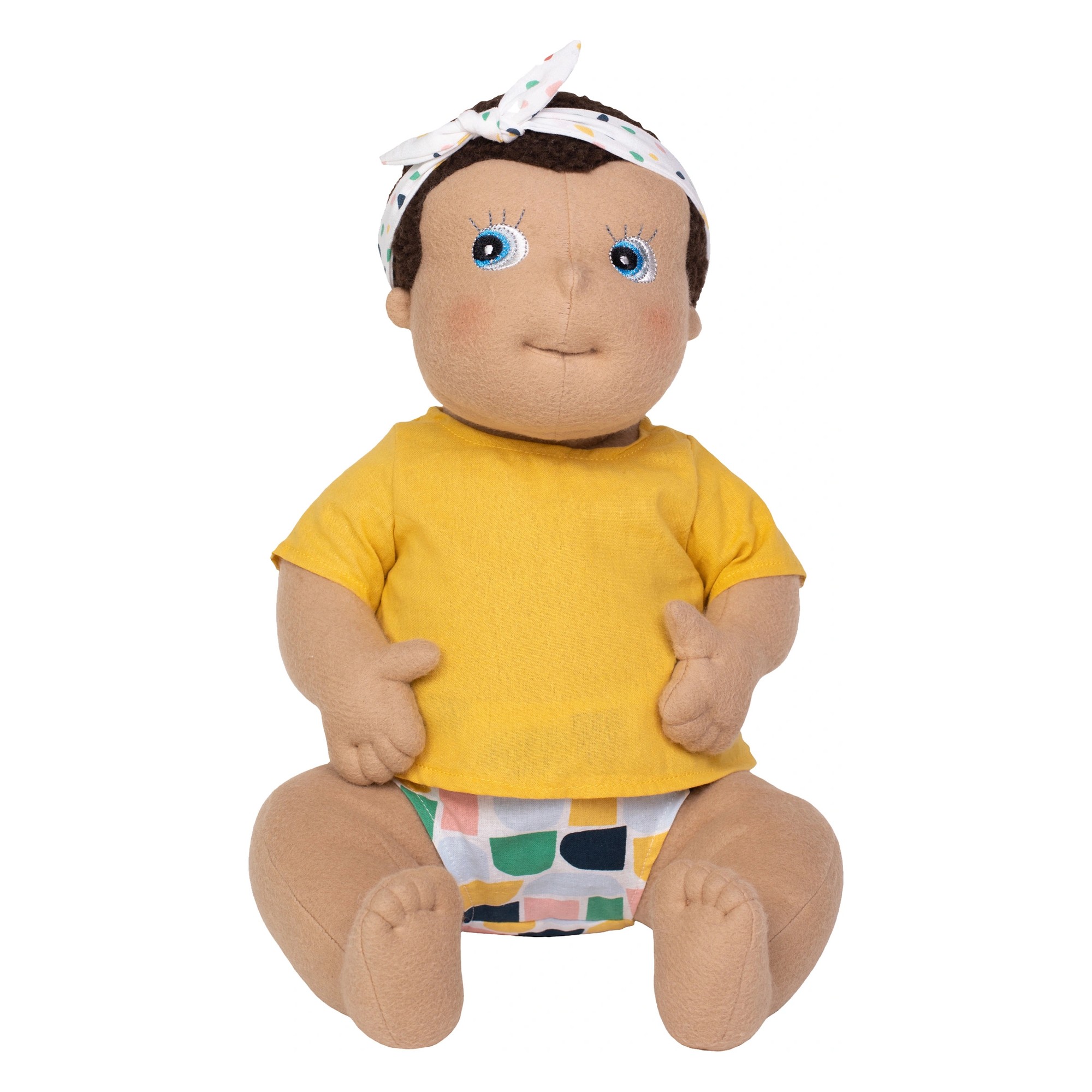 Rubens Barn baby doll Disa with dotted headband, yellow shirt and colourful nappy pants, sitting