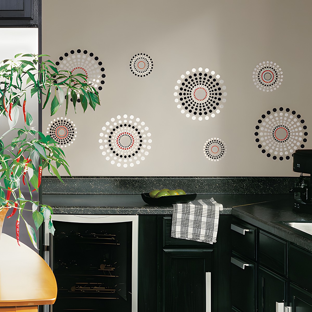 RoomMates wall decal Fusion Peel & Stick, concentric dot circles in black, white and red on a beige kitchen wall