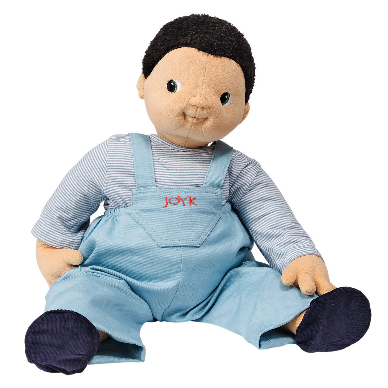 Joyk Empathiepuppe Antonio mit dunklem Haar, gestreiftem Shirt und hellblauer Latzhose, sitzend