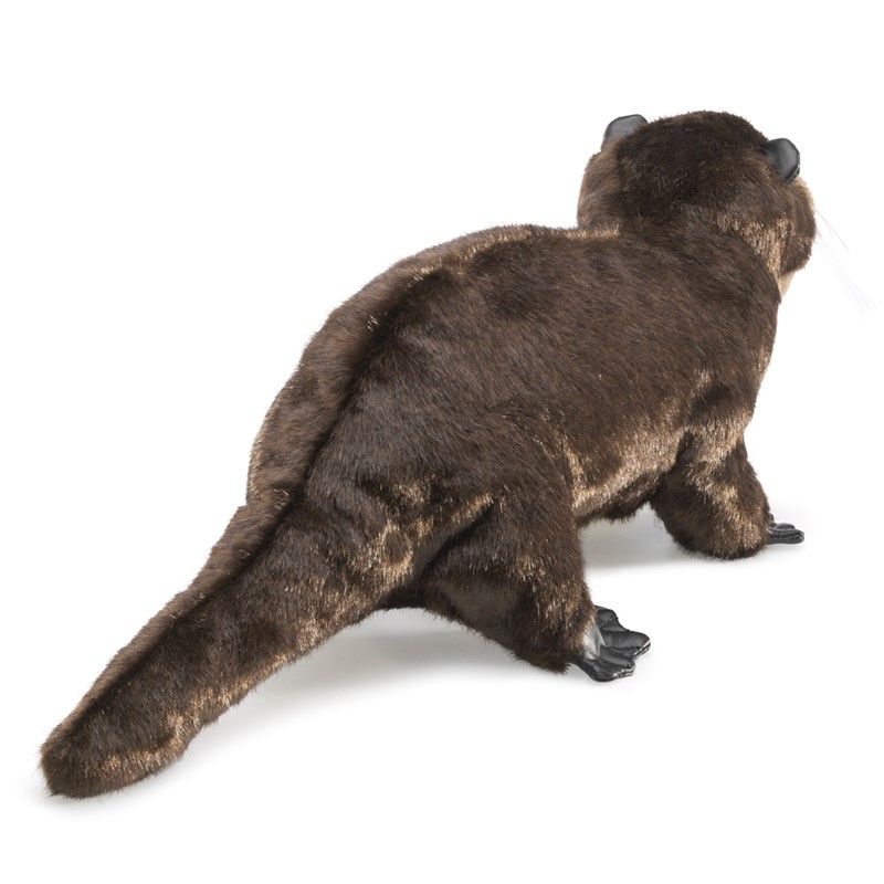 Folkmanis Handpuppe Flussotter in dunkelbraunem Plüsch, stehend in Schrägansicht von hinten mit charakteristischem Schwanz und schwarzen Pfoten.
