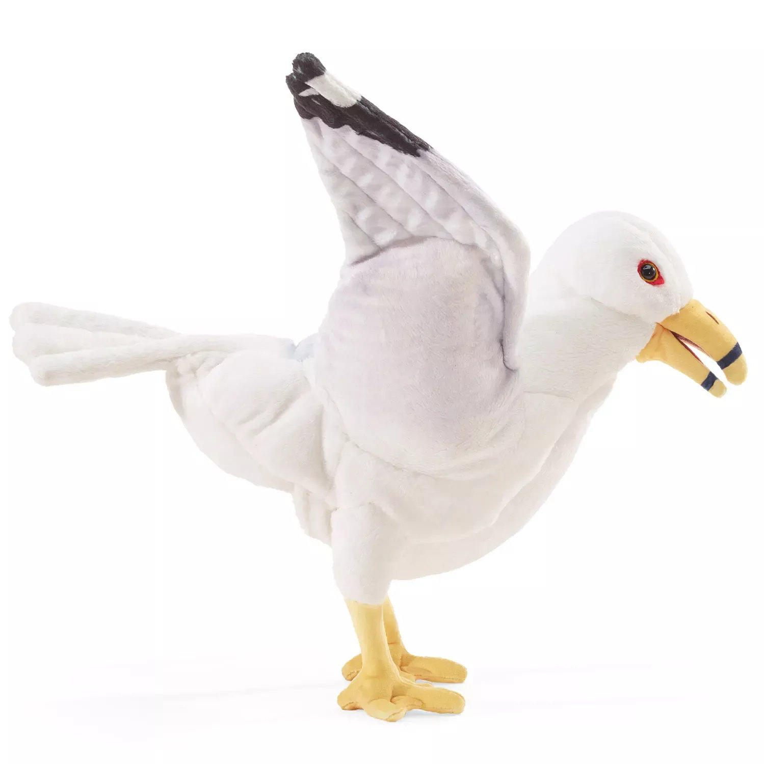Folkmanis seagull hand puppet in white and light grey with black wingtips, yellow beak and red eye, side view with spread wings