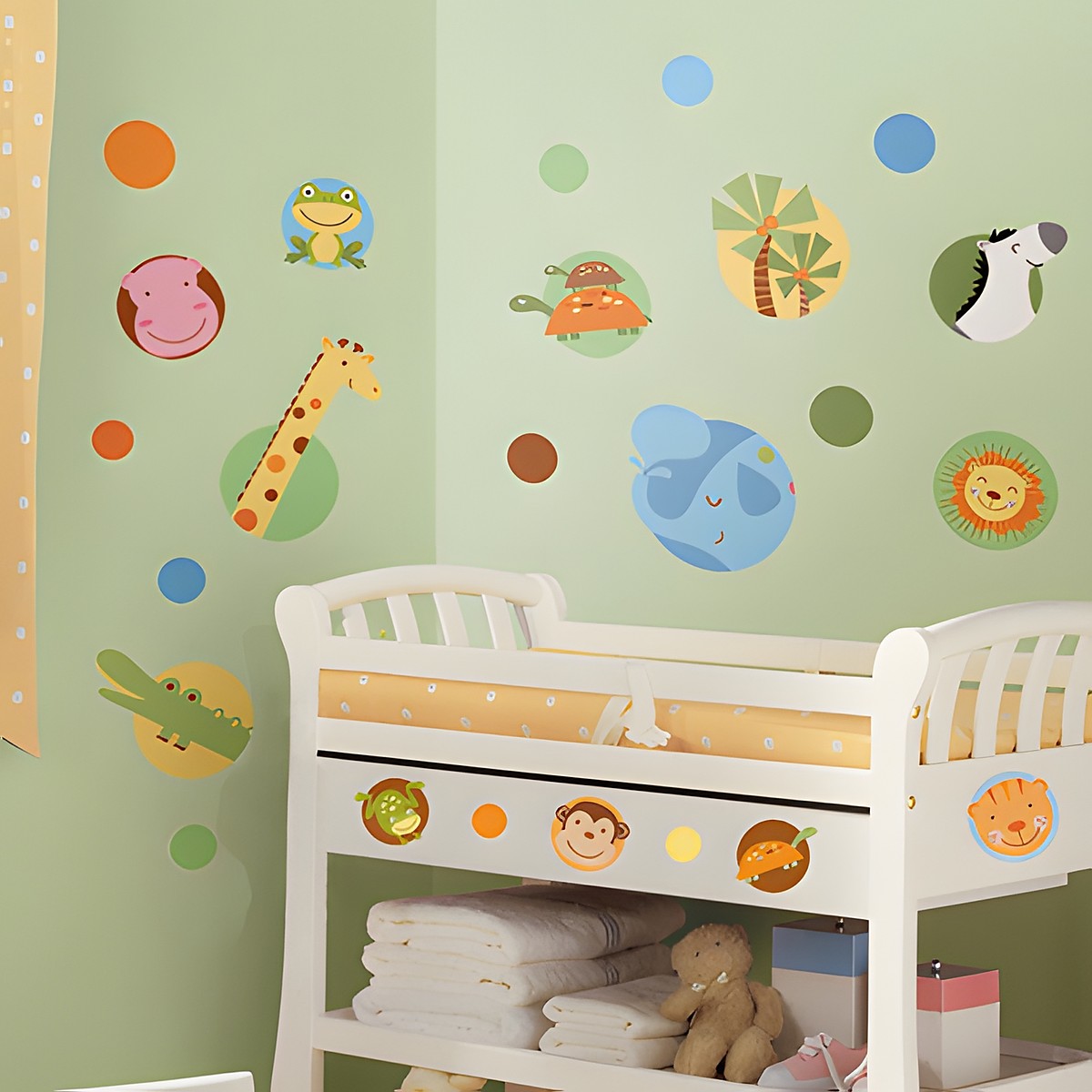 RoomMates wall decal Jungle Animal Polka Dot, jungle animals in colourful dot circles such as monkey, frog, giraffe and elephant on a green children's room wall above a changing table