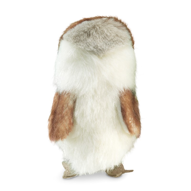 Folkmanis mini barn owl finger puppet seen from behind, standing, with white and brown-grey plush plumage