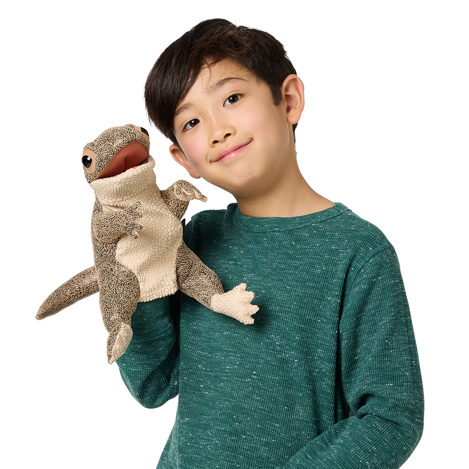 Junge hält Folkmanis Handpuppe Eidechse mit beweglichem Maul und detaillierter Schuppenstruktur in Beige-Braun in die Höhe.