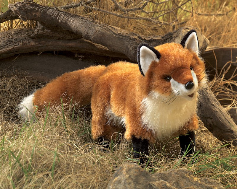 Folkmanis Handpuppe großer Rotfuchs mit orangebraun-weißem Fell und schwarzen Pfoten, stehend vor Wurzelwerk